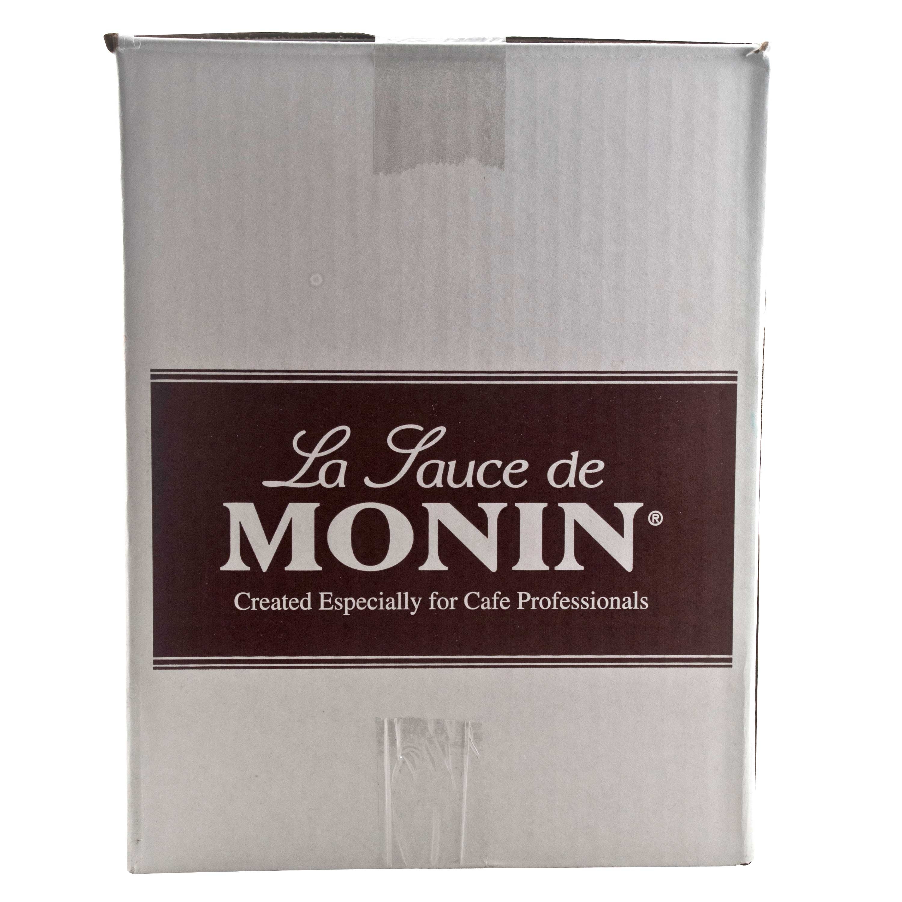 Monin White Chocolate Sauce, 64 Ounce -- 4 per case.