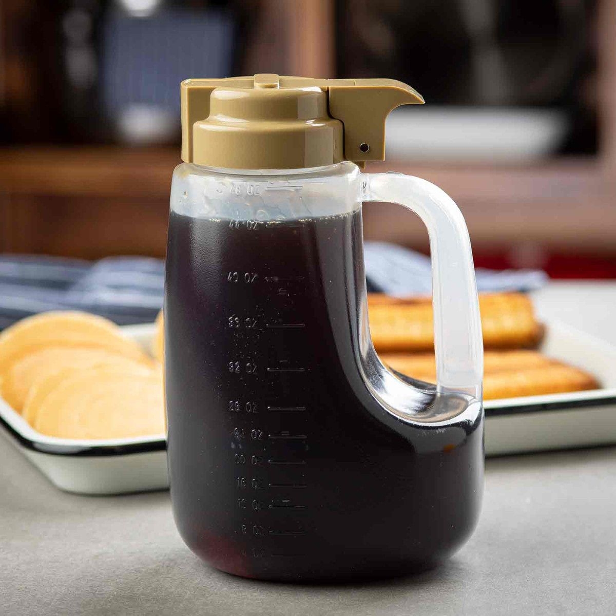 Tablecraft Clarified Polypropylene Condiment Dispenser with Beige ABS Top, 48 Ounce Capacity -- 6 per case