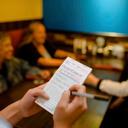 National Checking Company Guest Check Paper - 1 Part Green, 17 Line, 3.5 x 6.75 inch -- 5000 per case.