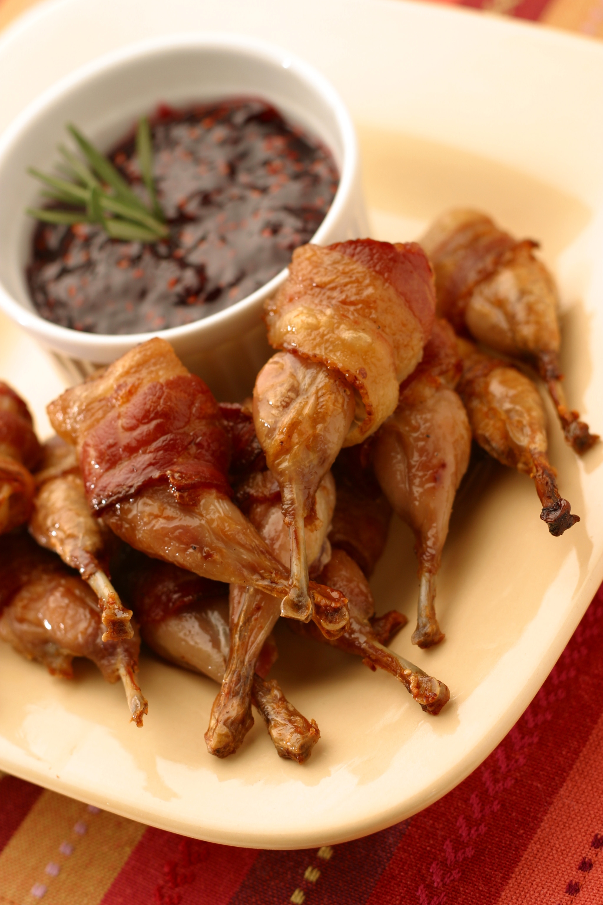 Manchester Farms Bacon Wrapped Partially Marinated Boned Quail Leg, 2.5 Pound -- 2 per case.