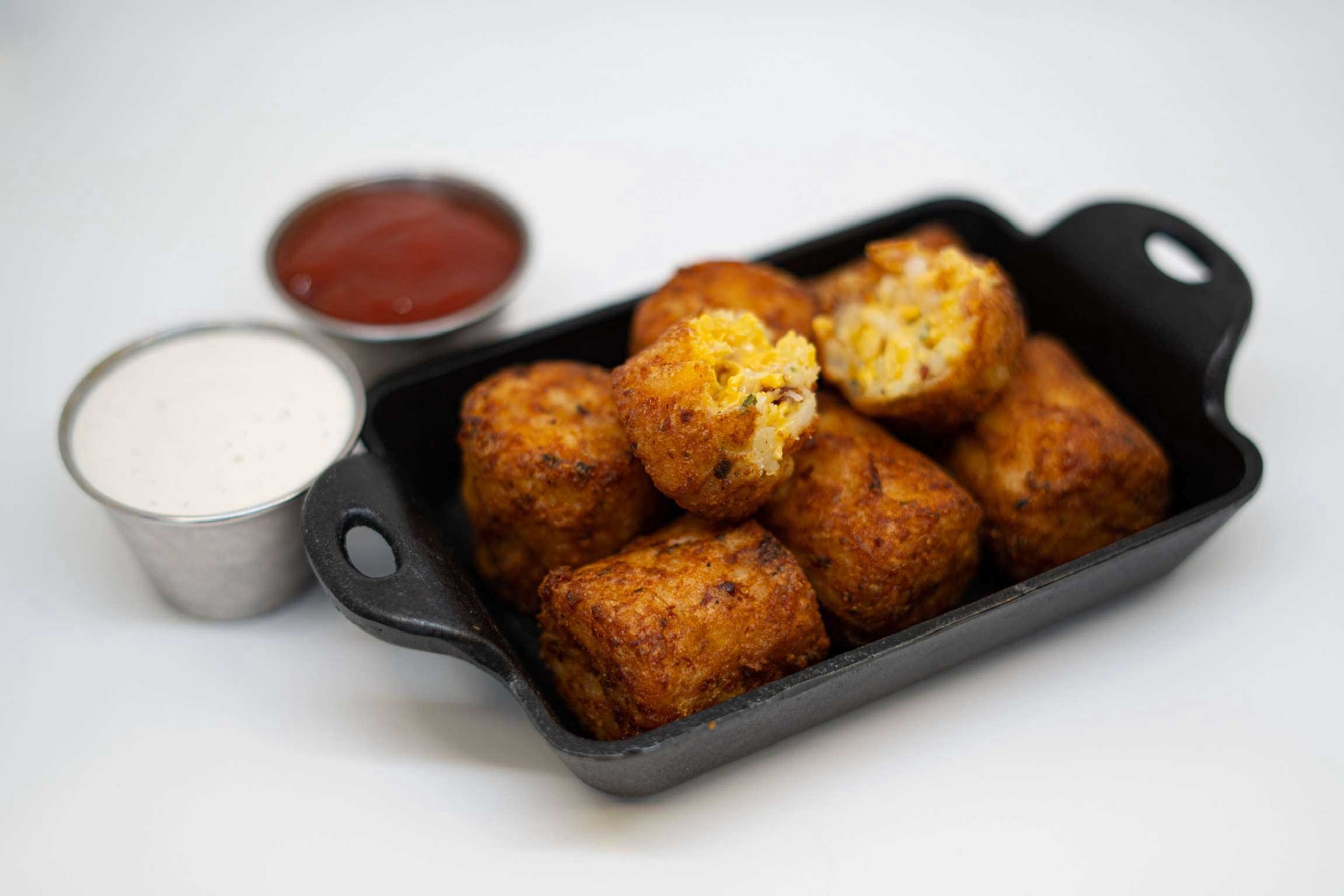 Stone Gate Foods Jumbo Stuffed Tater Keg with Bacon White Cheddar and Chives, 1.5 Ounce -- 106 per case.